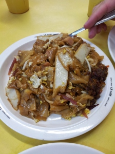 char kway teow (stir-fried flat rice noodles and/or ricecake strips)