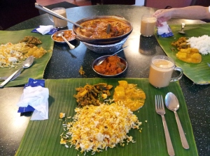 fish head curry with  briyani, pumpkin, chicken tikka masala, potatoes, kashmiri naan, and masala chai tea at Samy's Curry