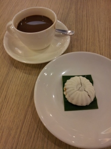tutu kueh (rice flour with shredded coconut filling) and kopi (coffee)